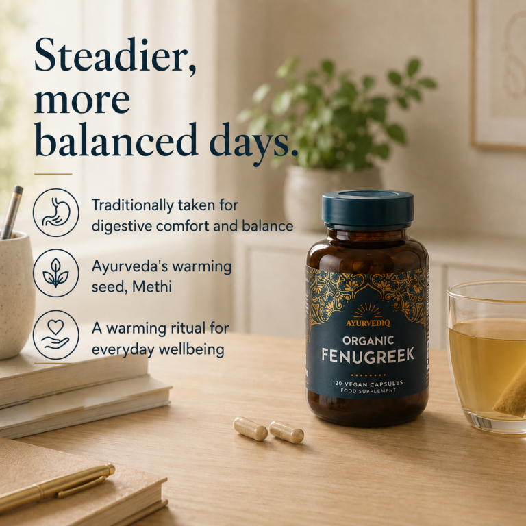 Ayurvediq Organic Fenugreek Capsules (120 count) on a wooden table with a cup of tea, two capsules, and a green plant, available at Fisa Health.