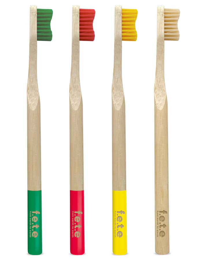 F.E.T.E. Multipack Soft Bamboo Toothbrushes, pack of 4 with colorful bristles and tips, shown as an eco-friendly option for families, available at Fisa Health.