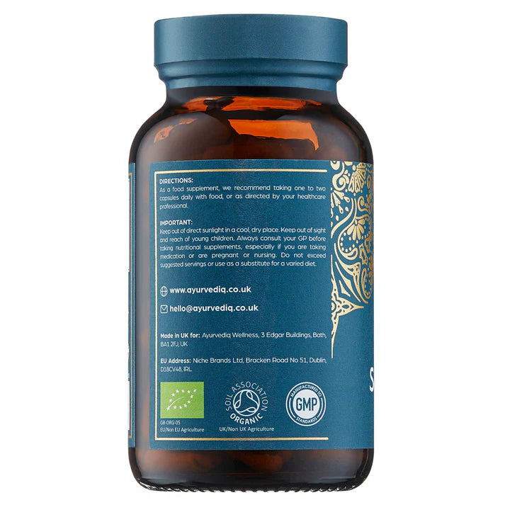 A brown bottle with a dark blue cap and a blue label displaying directions, contact info, certifications, and GMP logos. Organic Shatavari 120 Vegan Capsules, available at Fisa Health.