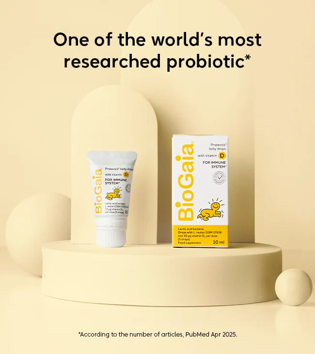 BioGaia Protectis Baby Drops with Vitamin D 10ml appear on beige podiums, with the phrase “One of the world’s most researched baby probiotics” displayed above, available at Fisa Health.