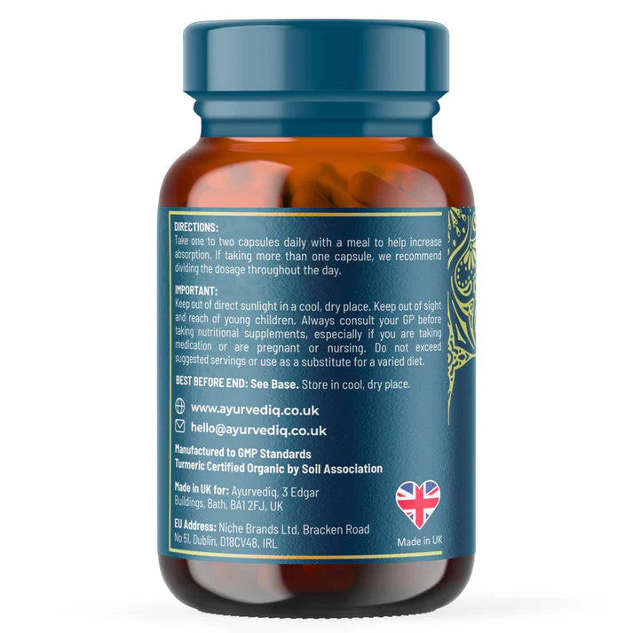 A brown bottle labeled Boswellia Serrata and Turmeric (60 capsules) with a blue label, featuring usage instructions, support info, storage tips, contact details, and a Made in UK symbol, available at Fisa Health.