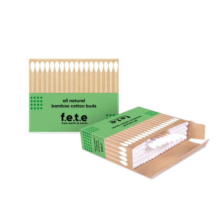 Two green and brown boxes of F.E.T.E. Bamboo Cotton Buds, one open to display white cotton buds, with the brand name visible on both biodegradable packages, available at Fisa Health.