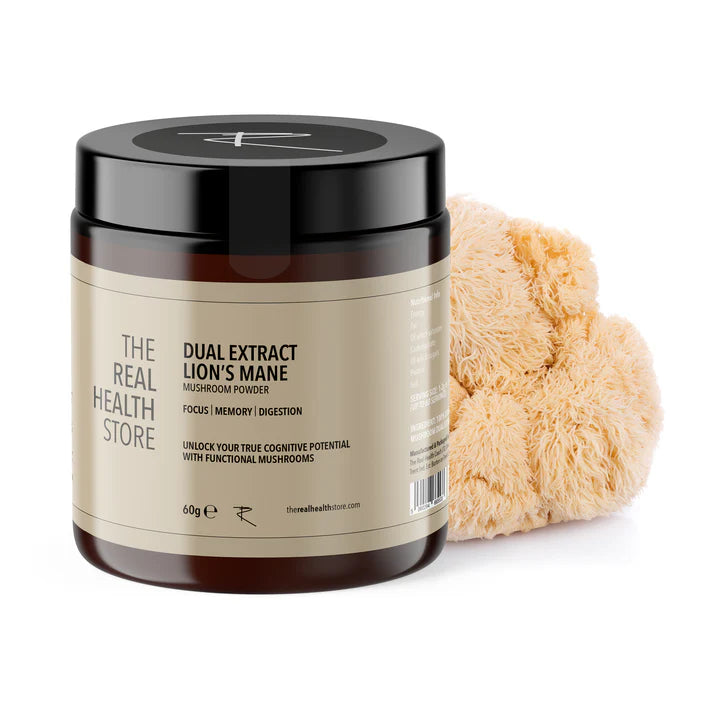 A jar of Dual Extract Lion's Mane Mushroom Powder - 60 grams is placed next to a fresh mushroom with packaging highlighting beta glucans on a white background, available at Fisa Health.