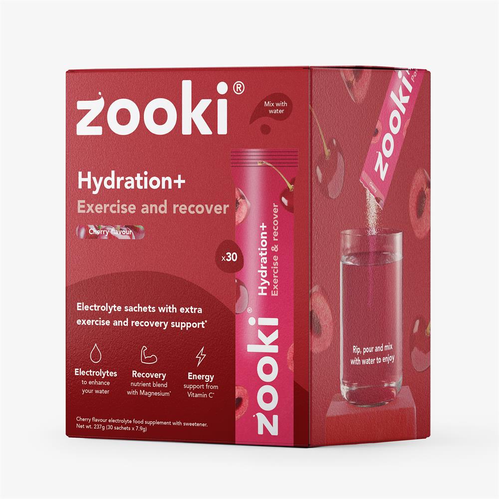 A box of Zooki Electrolytes+ Exercise & Recover Cherry 30 x 7.9g sachets next to a glass of water, available at Fisa Health.
