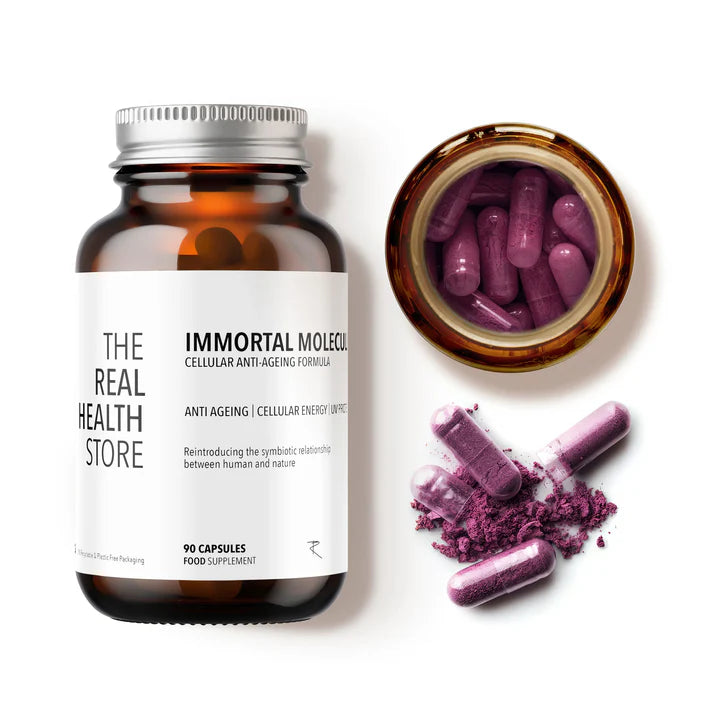 A bottle of Immortal Molecules - UV Cellular Protection, Ultimate Longevity (90 capsules) with vibrant purple NMN capsules and powder spilling out, available at Fisa Health.