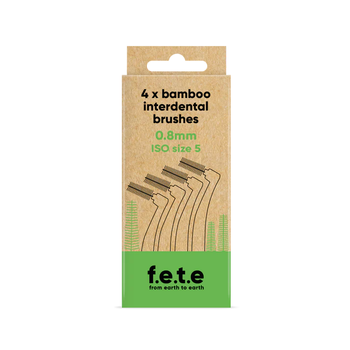 A cardboard box labeled F.E.T.E. Bamboo Interdental Brushes, 4 x 0.8mm (ISO size 5), with eco-friendly oral care symbols and illustrations, available at Fisa Health.