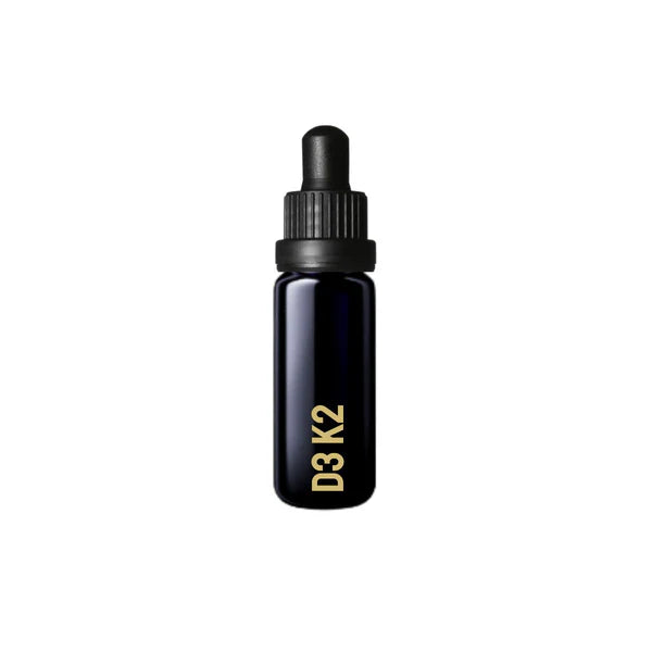 A black dropper bottle labeled Mycell Inside Vitamin D3 & K2 with gold lettering stands upright on a white background, highlighting MyCell Technology, available at Fisa Health.