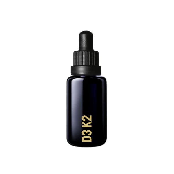 A dark glass dropper bottle labeled "Mycell Inside Vitamin D3 & K2" stands upright on a white background, available at Fisa Health.