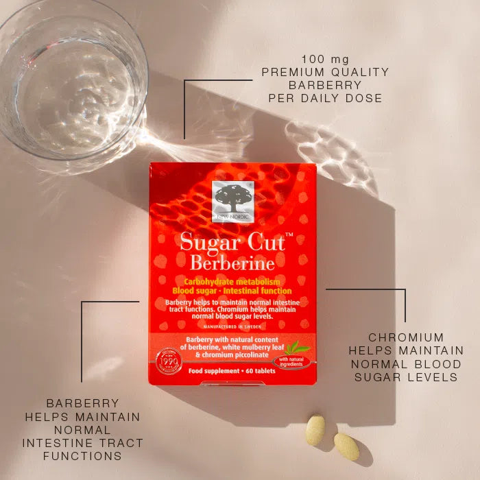 A box of New Nordic Sugar Cut Berberine 60 tablets next to a glass of water and two tablets, available at Fisa Health.