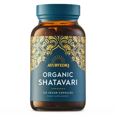 Ayurvediq Organic Shatavari, 120 vegan capsules in a brown bottle with gold patterns and blue cap, available at Fisa Health.