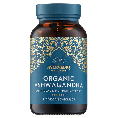 A brown bottle showing the label "Organic Ashwagandha With Black Pepper Extract," 120 vegan capsules, featuring a blue and gold design, available at Fisa Health.
