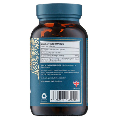 A brown bottle of Organic Moringa 120 Vegan Capsules with a label showing ingredients, barcode, recycling symbol, and a British flag indicating it's made in the UK, available at Fisa Health.