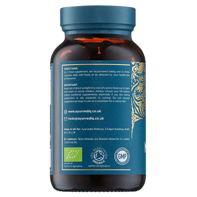 A brown bottle labeled Organic Moringa 120 Vegan Capsules with a blue label showing directions, notes, certifications, and contact info on the back, available at Fisa Health.