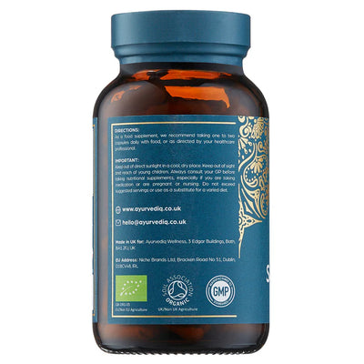 A brown bottle with a dark blue cap and a blue label displaying directions, contact info, certifications, and GMP logos. Organic Shatavari 120 Vegan Capsules, available at Fisa Health.