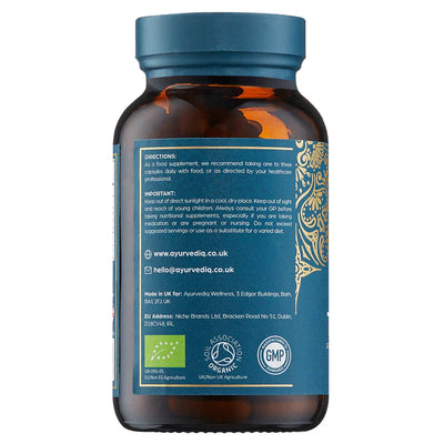 A brown bottle with a blue label displaying directions, details, and certifications for Organic Turmeric Ginger & Black Pepper Extract 120 Vegan Capsules, available at Fisa Health.