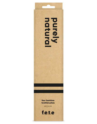 F.E.T.E. Natural Vegan Medium Bamboo Toothbrushes with charcoal bristles, pack of 4, in a brown box, available at Fisa Health.