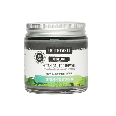A jar of Adult’s Truthpaste charcoal botanical toothpaste, vegan and zero waste, with peppermint and spearmint, shown on a white background, available at Fisa Health.