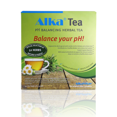 Front of Alka® Tea box displays a cup of herbal tea, chamomile flowers, and text highlighting 52 herbs. The packaging is green with yellow and red accents. Available at Fisa Health.