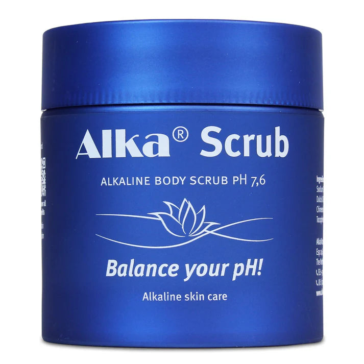 Blue Alka® Scrub jar, pH 7.6, features a lotus graphic and highlights Himalayan salt. Exfoliating alkaline body scrub designed for balanced pH, available at Fisa Health.