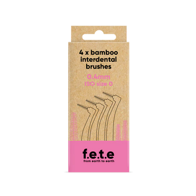 A cardboard box of F.E.T.E. Bamboo Interdental Brushes, 4-pack, 0.4mm ISO 0, featuring brush images and branding on a pink band, available at Fisa Health.