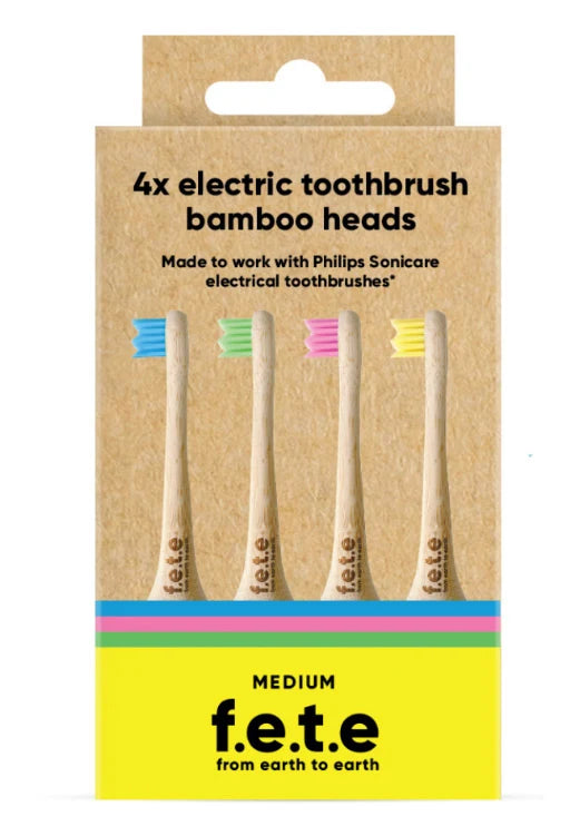 Set of four medium F.E.T.E Electric Compatible bamboo toothbrush heads by from earth to earth, with colored bristles and eco-friendly packaging, available at Fisa Health.