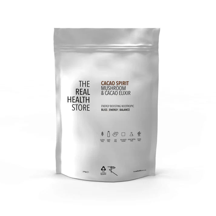 A silver resealable pouch labeled Cacao Spirit (Cacao & Mushroom) Elixir 270g, highlighting cacao and mushrooms with graphic icons on the front, available at Fisa Health.