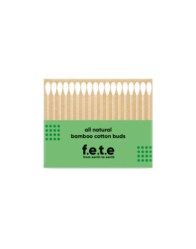 A box of F.E.T.E. Bamboo Cotton Buds with a green and brown design displays the cotton tips through the packaging, available at Fisa Health.