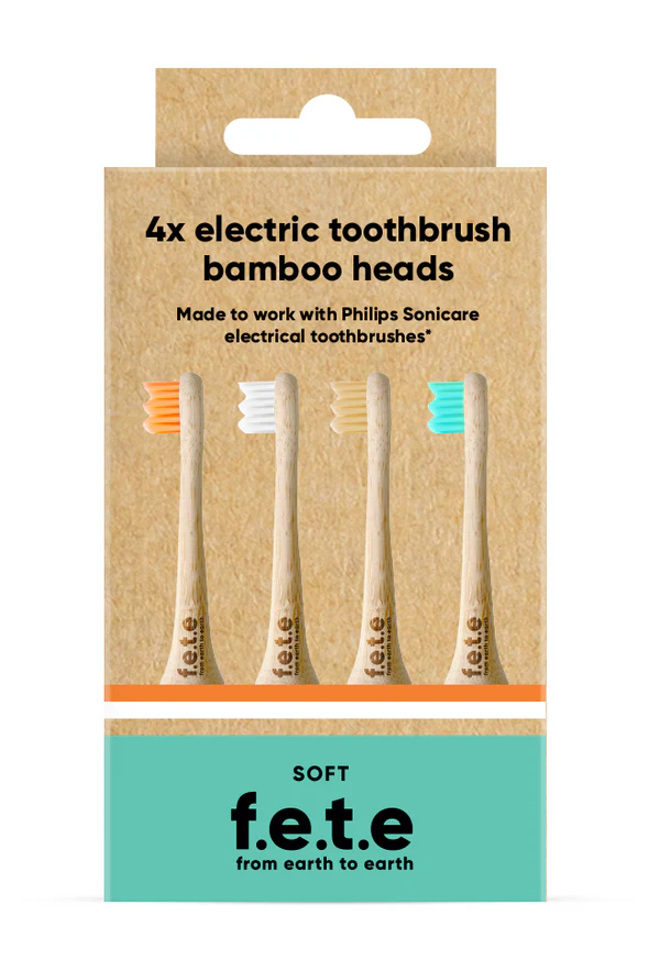 A box labeled “F.E.T.E Electric Compatible toothbrush heads” with four compostable heads featuring different colored bristles, displayed above the text FISA Health, available at Fisa Health.