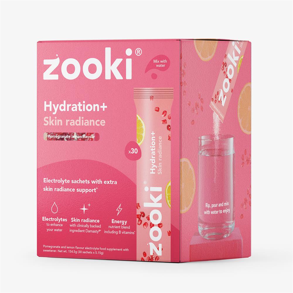 A box of Zooki Electrolytes+ Skin Radiance Pomegranate 30 x 5.15g sachets next to a single sachet and a glass of water, available at Fisa Health.