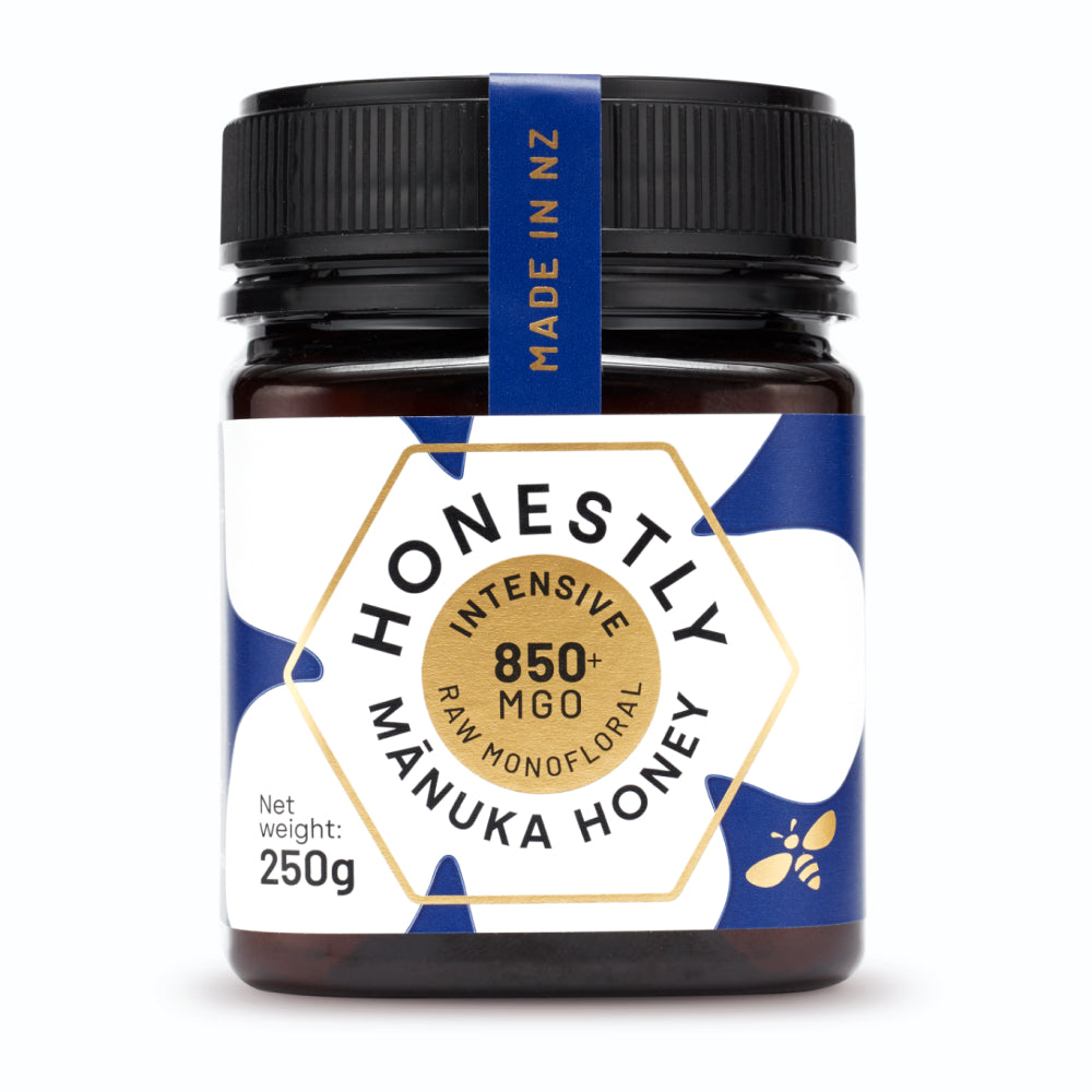 A small glass jar of Honestly Manuka Premium Raw Manuka Honey 850+ MGO 250g Intensive from New Zealand, available at Fisa Health.