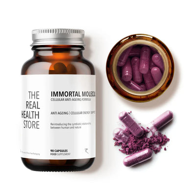 A bottle of Immortal Molecules - UV Cellular Protection, Ultimate Longevity (90 capsules) with vibrant purple NMN capsules and powder spilling out, available at Fisa Health.