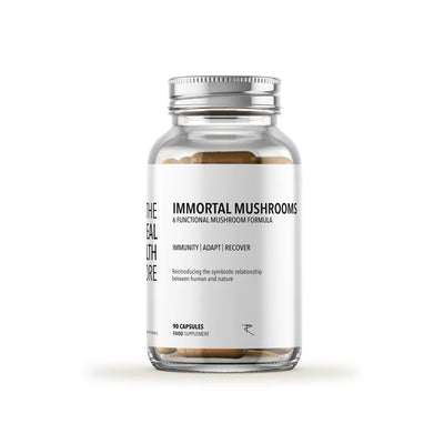 A clear bottle of Immortal Mushrooms Immune Boost (90 caps) with tan capsules inside, displayed as a food supplement, available at Fisa Health.