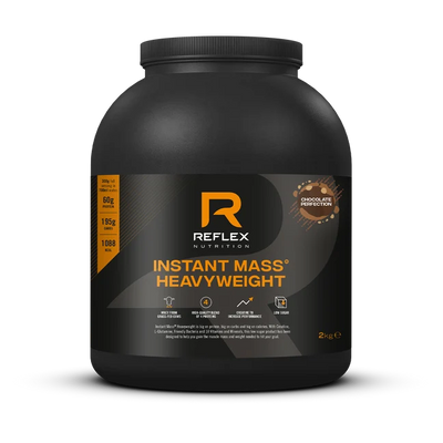 Reflex Nutrition Instant Mass Heavyweight 2kg, chocolate perfection flavor, in a black tub with orange and white label text, available at Fisa Health.