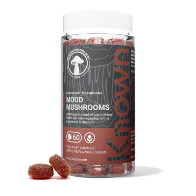 A bottle of Known Nutrition Mood Mushrooms Gummies - 60 pack with two gummies placed in front, available at Fisa Health.