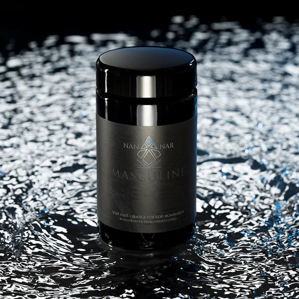A black jar labeled Nannar Masculine stands on rippling water with dramatic lighting, available at Fisa Health.