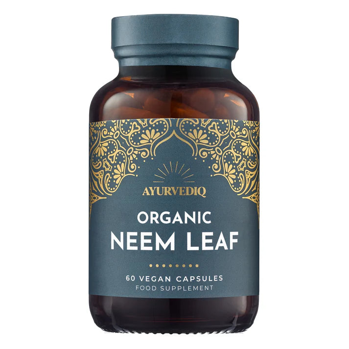 A brown bottle of Organic Neem Leaf 60's vegan capsules with a gold-accented label, available at Fisa Health.