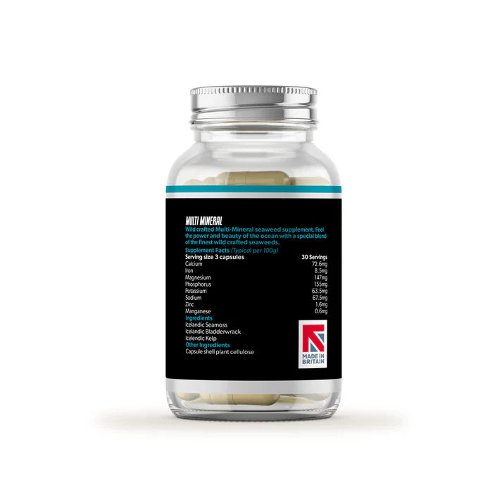 A clear bottle with a silver lid contains Raw Sport Pacifica Multi-Mineral vegan capsules. The black label lists minerals and displays a Made in Britain logo, available at Fisa Health.