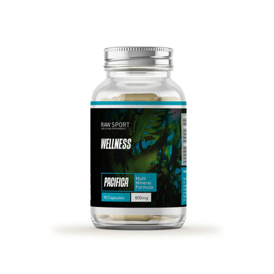 A clear bottle of Raw Sport Pacifica – Multi-Mineral Support Formula vegan capsules with a leafy label, silver lid, and 90 x 800mg capsules, available at Fisa Health.
