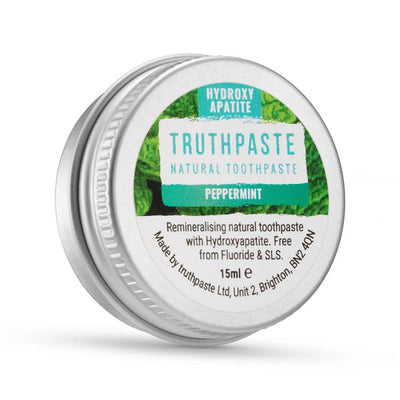 Truthpaste Hydroxyapatite Toothpaste (Peppermint) in a 15ml metal tin, labeled as fluoride and SLS free, available at Fisa Health.