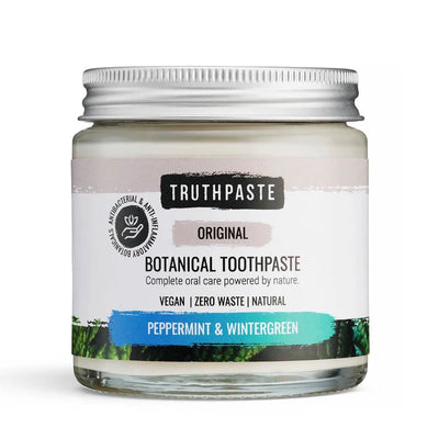 A glass jar of Adult’s Truthpaste by Truthpaste, a vegan and zero waste toothpaste with peppermint and wintergreen, available at Fisa Health.
