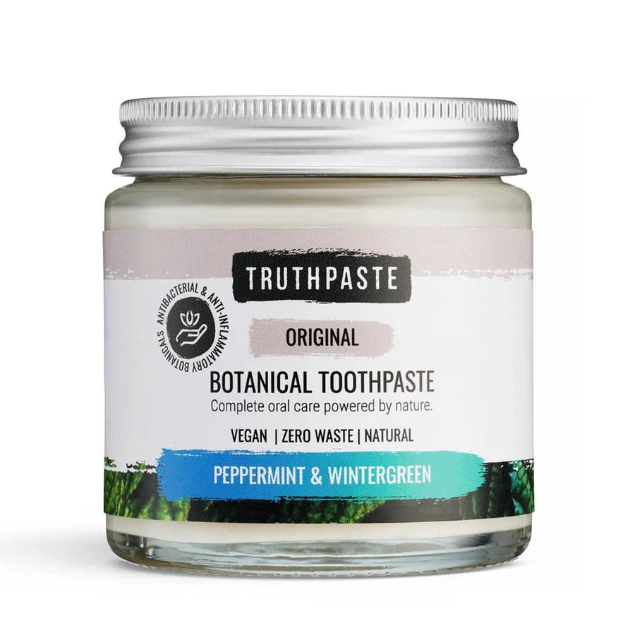 A glass jar of Adult’s Truthpaste by Truthpaste, a vegan and zero waste toothpaste with peppermint and wintergreen, available at Fisa Health.
