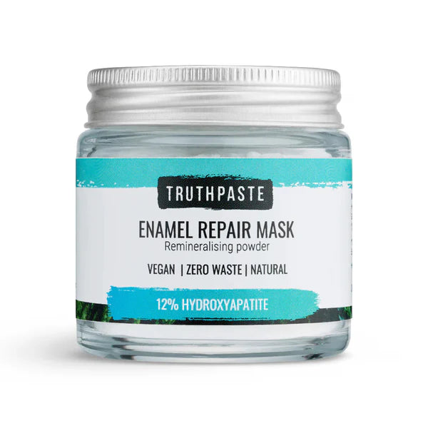 A glass jar labeled Truthpaste Enamel Repair Mask powder, featuring vegan, zero waste, and natural claims with 12% hydroxyapatite, available at Fisa Health.