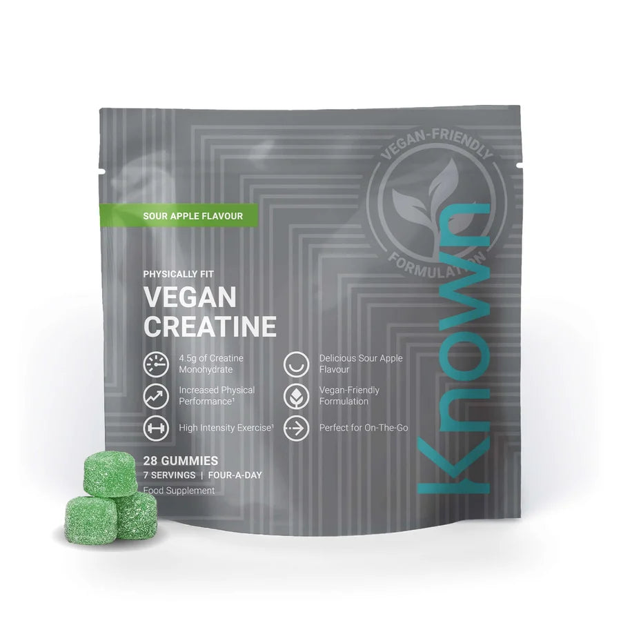 A pouch of Known Nutrition Vegan Creatine Gummies with three green sugar-coated creatine monohydrate gummies in front, available at Fisa Health.