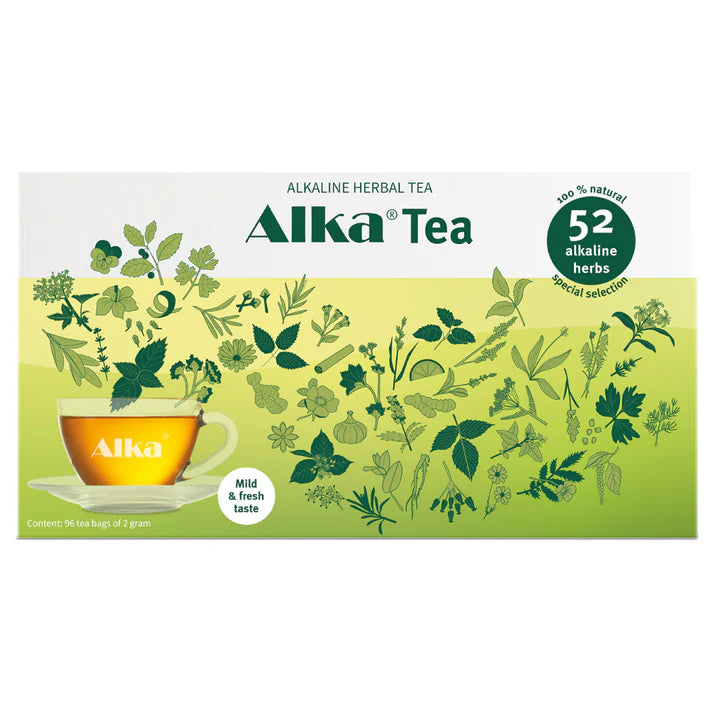 A box of Alka® Tea with a yellow-green gradient design, images of assorted herbs, a glass cup, and text highlighting a 52-herb caffeine-free blend, available at Fisa Health.