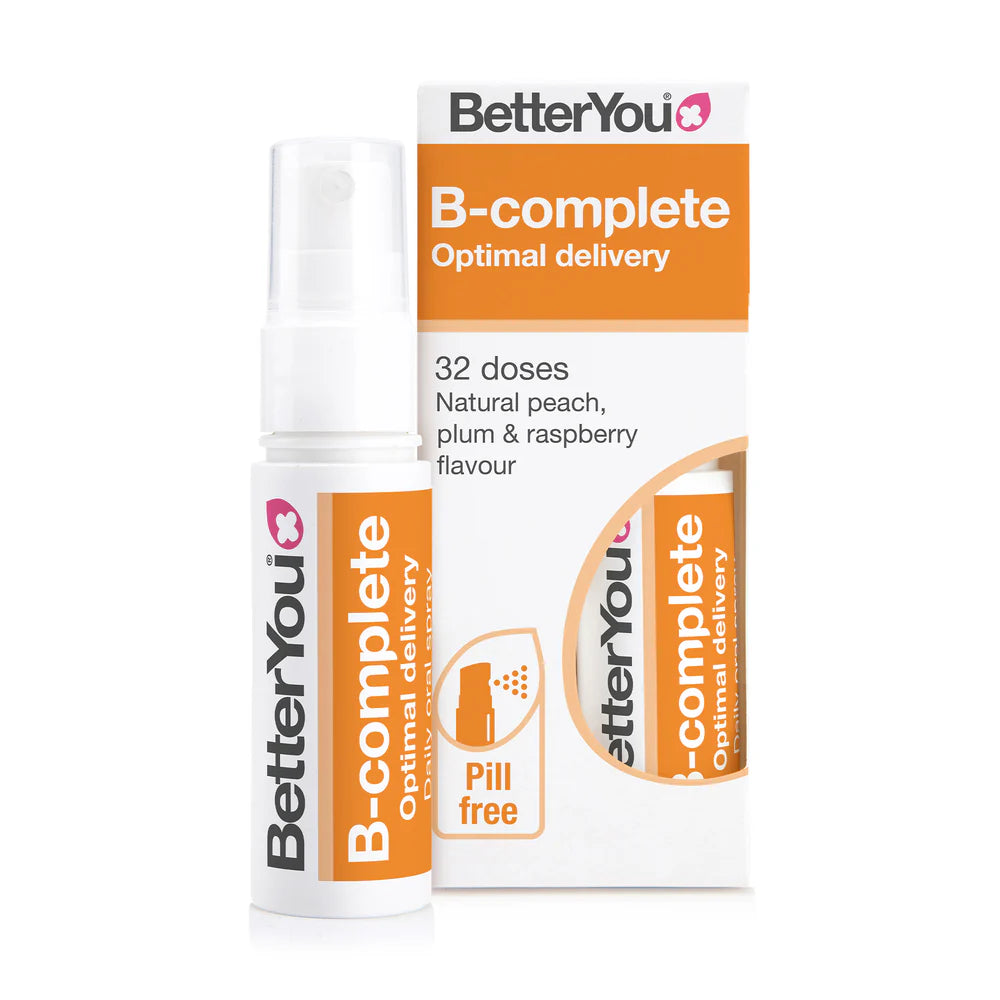 A BetterYou Vitamin B-Complete Oral Spray bottle and box shown with dosage information, vitamin B12, and peach, plum, and raspberry flavor details, available at Fisa Health.