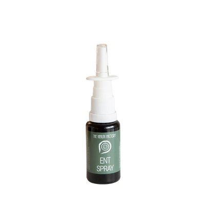 A small dark bottle labeled "ENT Spray" with a white nasal nozzle is shown against a plain white background; available at Fisa Health.