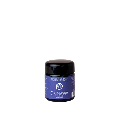 A small jar with a black lid and a purple label that reads "Okinawa Sea Coral Minerals" sits on a plain white background, available at Fisa Health.